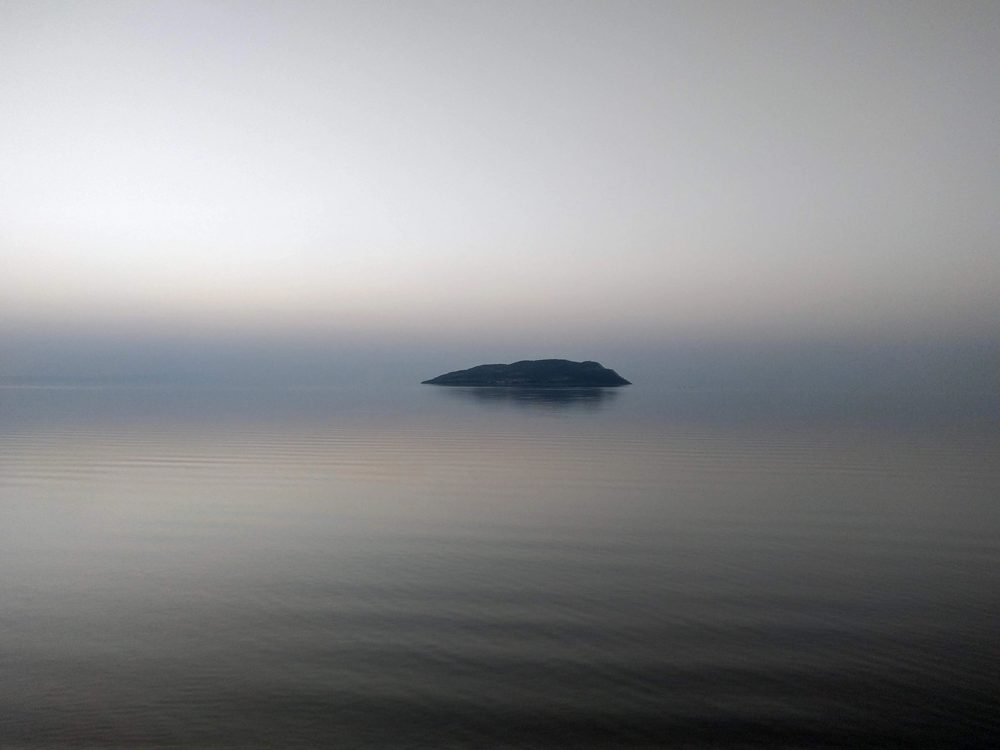 Misty view of the Rann with a small island
